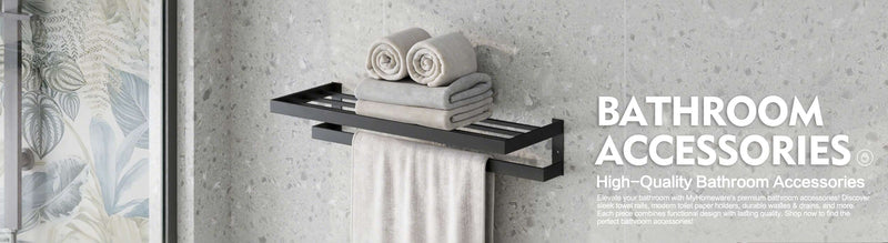Bathroom accessories including towels and a shelf on a gray wall