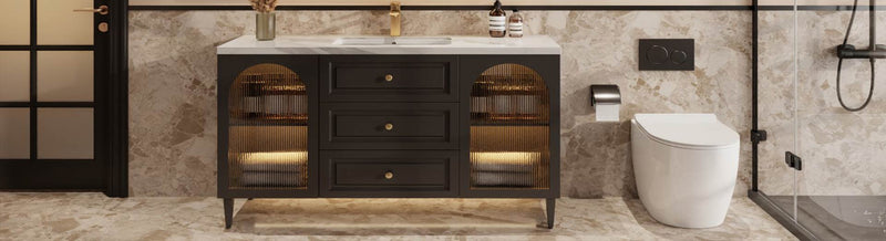 Modern freestanding vanity with legs and fluted glass doors in a luxurious marble bathroom