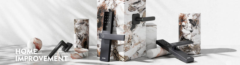 Modern black smart door locks and handles by ORVIBO displayed with marble blocks – Home Improvement collection banner.