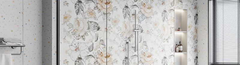 Chrome slide rail with round handheld sprayer on a floral wall panel, no mixer or taps shown.