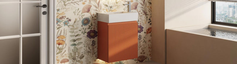 Wall hung fluted small vanity in orange finish with white basin