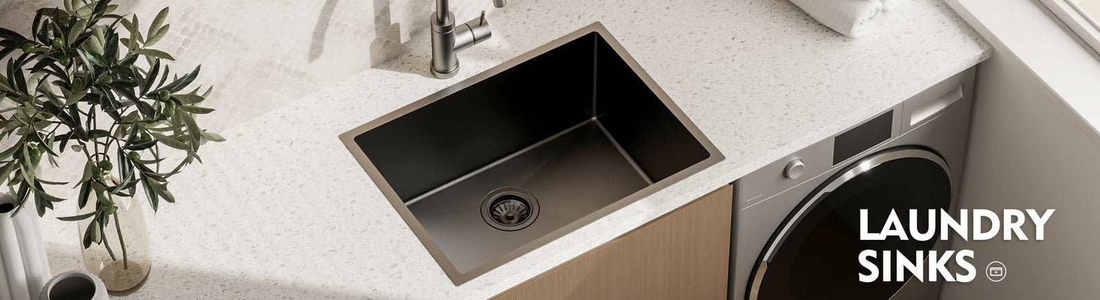 Modern laundry room with a black single bowl sink and stainless steel tap, showcasing premium laundry sinks from MyHomeware.