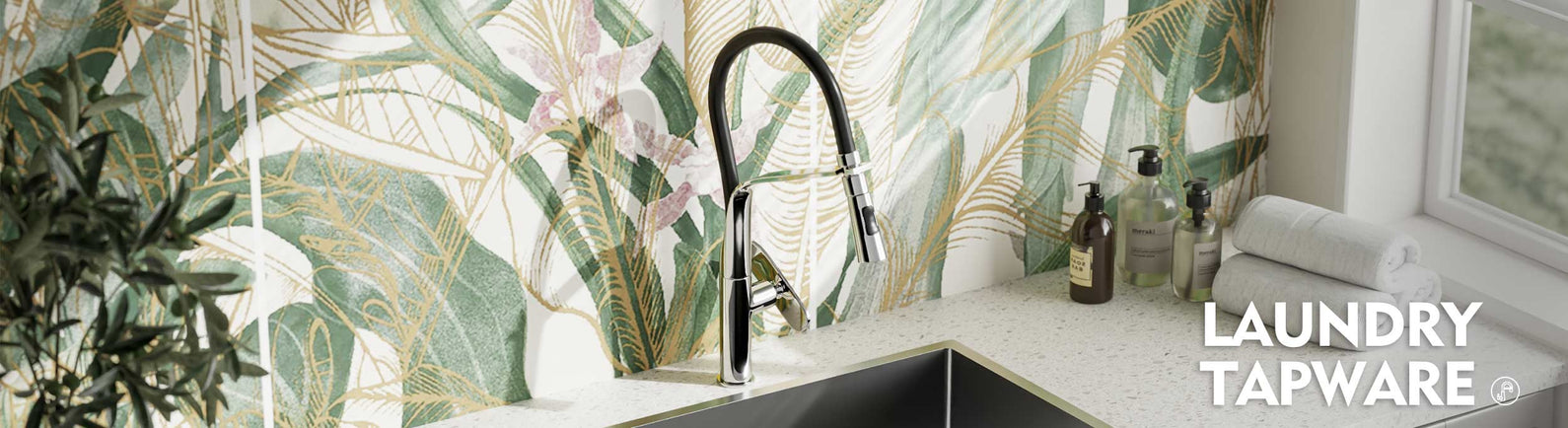 Stylish laundry tapware setup featuring leafy splashback and sleek black mixer, highlighting laundry tapware range at MyHomeware.