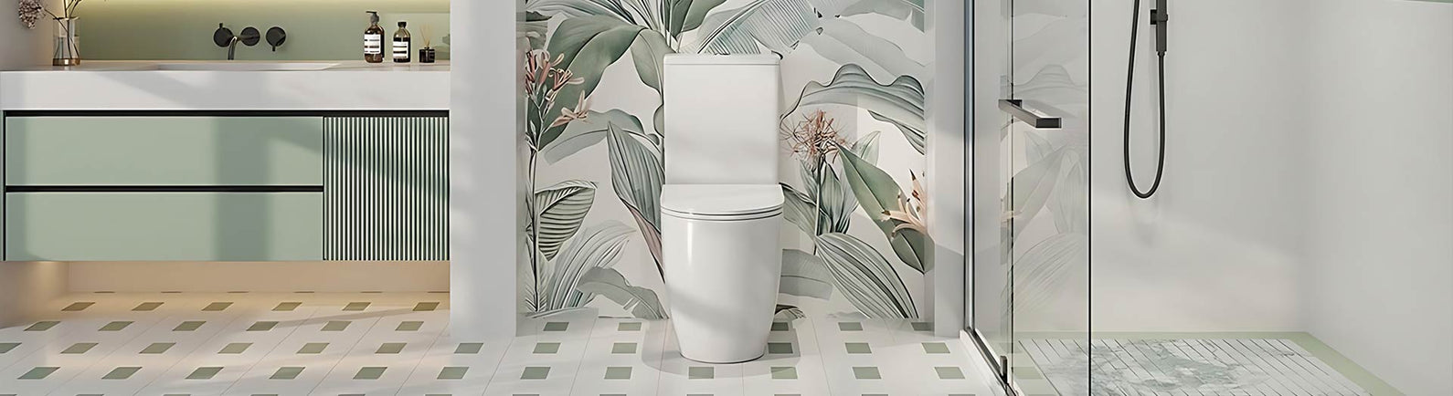 Bathroom with a toilet and shower area featuring leaf-patterned tiles.