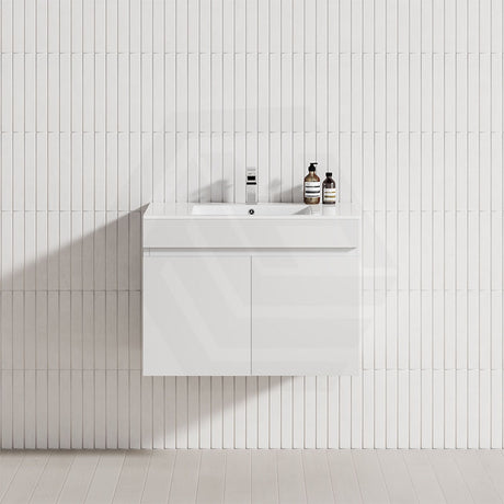A wall-hung matt white bathroom vanity with a single bowl sink, showcasing a modern floating design