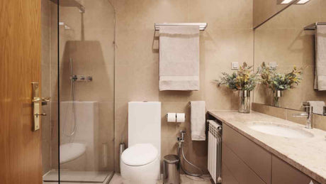 Modern bathroom with shower enclosure and close-coupled toilet