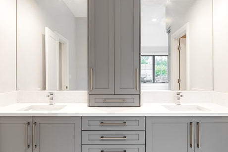 Minimalist bathroom with floating timber vanity, vessel basin, and glass shower