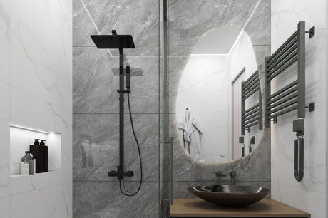 Modern bathroom with grey marble wall tiles, black shower fixtures and vessel basin