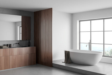 Modern bathroom with freestanding bathtub, wood slat accent wall, floating vanity, and large window.