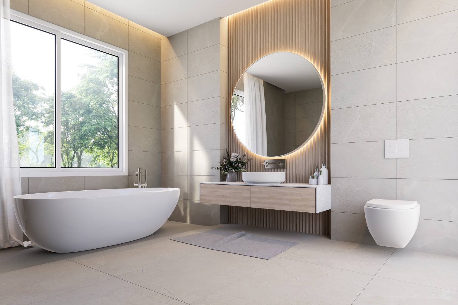 Modern bathroom with freestanding bathtub, round LED mirror, floating vanity, and large window.