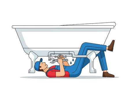 Plumber lying under bathtub repairing leaking pipe with wrench and visible water drops