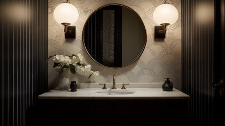 Art deco powder room with round mirror, scallop wallpaper and brass tapware