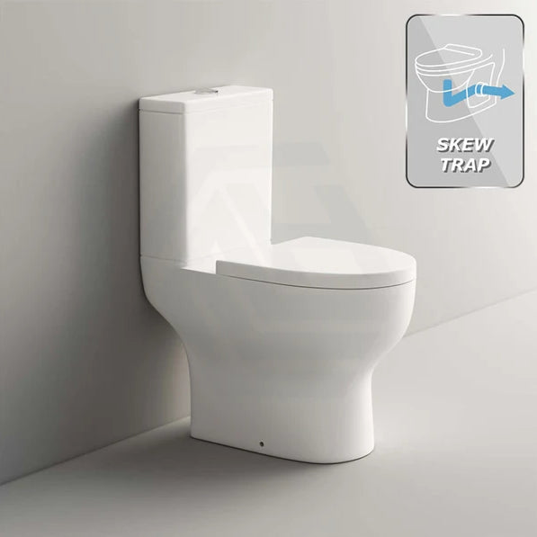 Skew trap close coupled toilet against a bathroom wall