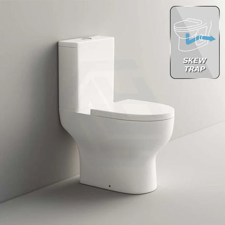Skew trap close coupled toilet against a bathroom wall