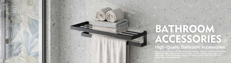 Bathroom accessories including towels and a shelf on a gray wall