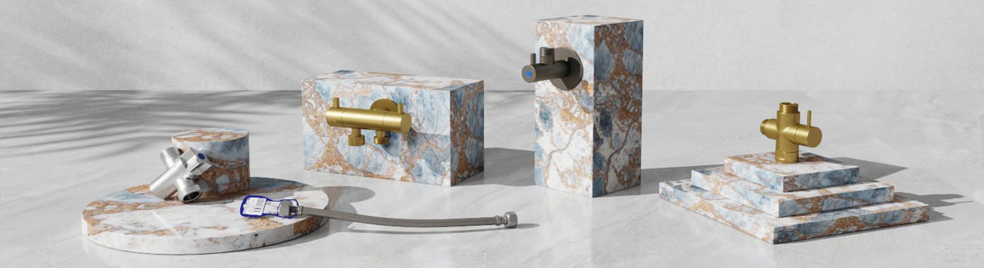 Bidet diverters and connectors on marble blocks