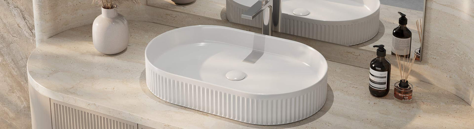 Glossy white ceramic basin with oval design