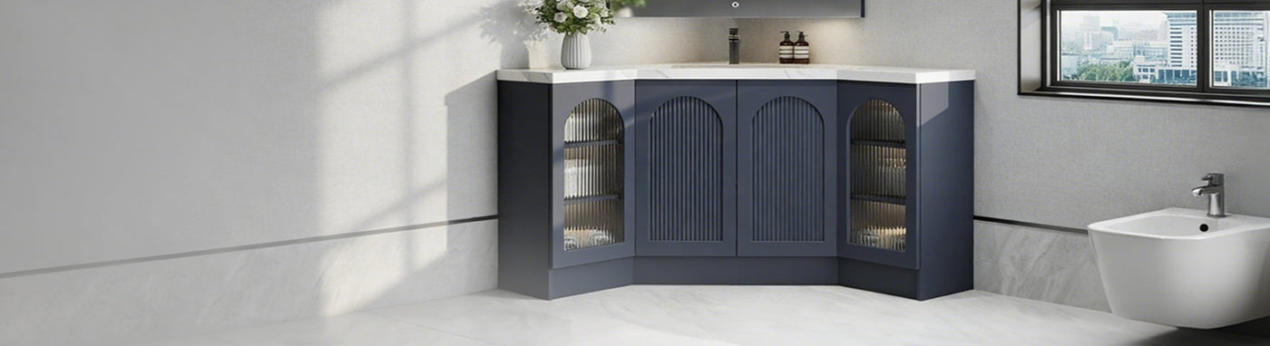 Curved navy corner vanity with fluted arch doors and ribbed glass panels
