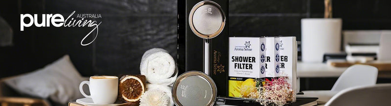 Pure Living Aroma Sense shower head and vitamin C shower filter set with towels and dried citrus décor