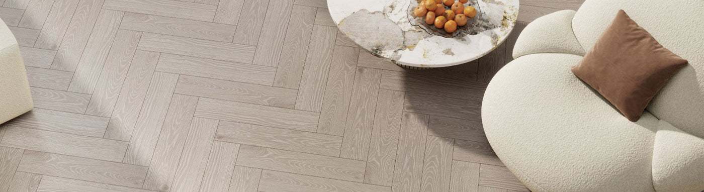 Modern timber-look tiles in herringbone pattern, ideal for contemporary flooring design