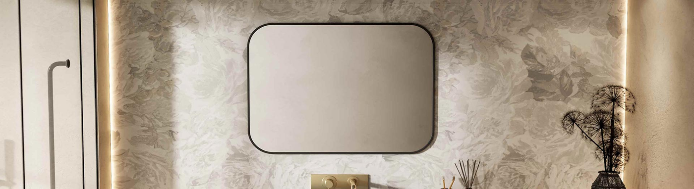 Rectangular framed mirror with rounded corners