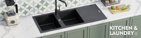 black granite kitchen sink in a white vanity top