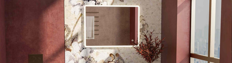 Square LED bathroom mirror with backlit frame mounted on a mosaic floral wall and surrounded by warm red-toned decor.