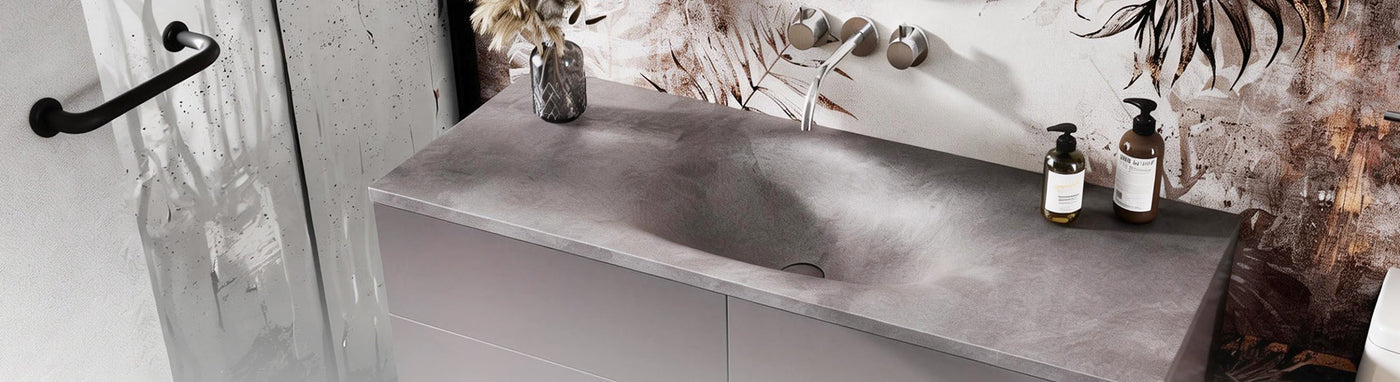 Dark grey concrete-look sintered stone vanity top with integrated basin