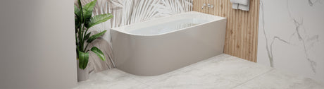 White corner bathtub with tropical leaf wall and wood accents.