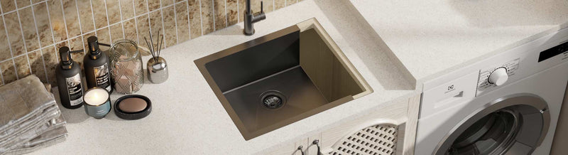 Contemporary flush mount stainless steel laundry sink with stone benchtop