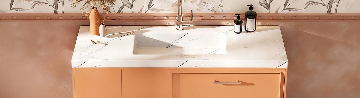 Sintered stone vanity top with integrated basi