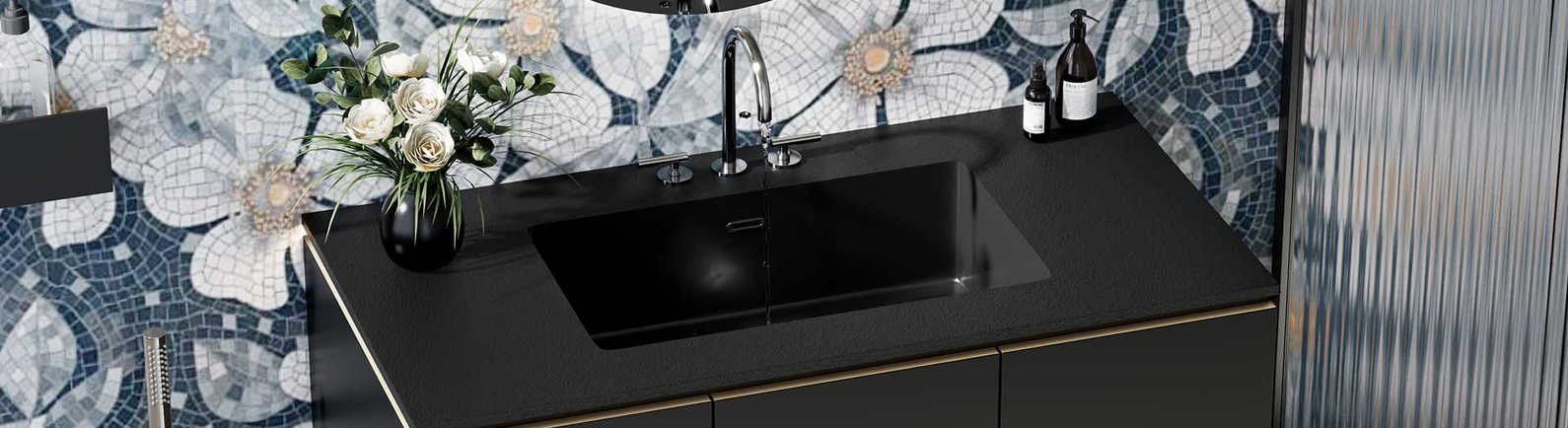 Black solid surface vanity top with integrated basin
