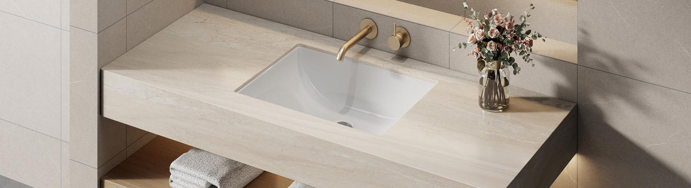 Under counter basin seamlessly integrated into stone vanity top