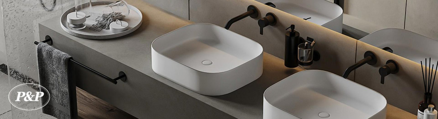 Dual basin setup with P&P sinks and bathroom accessories.