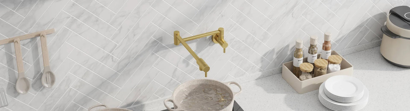 brushed gold pot filler tap on the wall