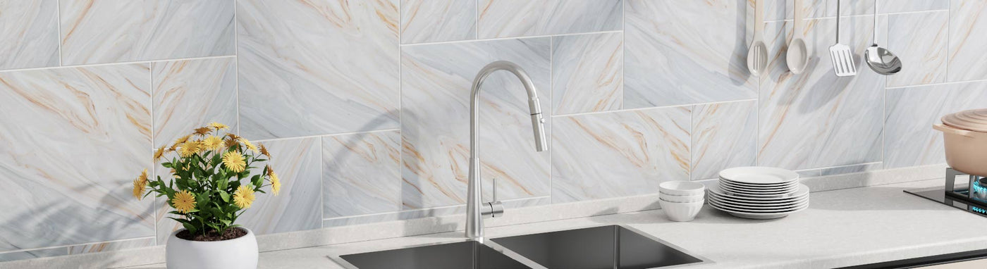 stainless steel sink mixer tap in a bright kitchen