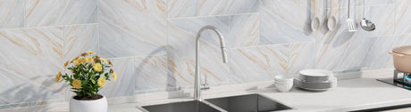 stainless steel sink mixer tap in a bright kitchen