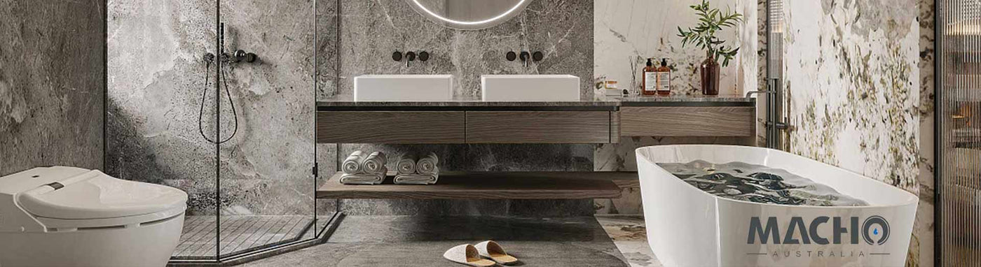 Macho bathroom featuring smart toilet, wall-hung vanity, and stone freestanding bath