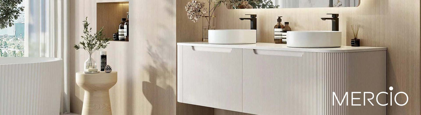Sophisticated bathroom featuring Mercio basins, mirrors, and toilets.