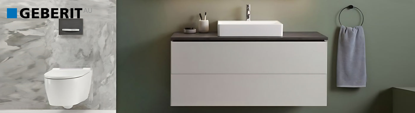 Geberit flush plate and wall-mounted toilet with vanity in a modern bathroom.