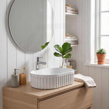Infinity Oval Fluted Ceramic Above Counter Basin 555x355x150mm - Variant Colour