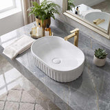 Infinity Oval Fluted Ceramic Above Counter Basin 555x355x150mm - Variant Colour