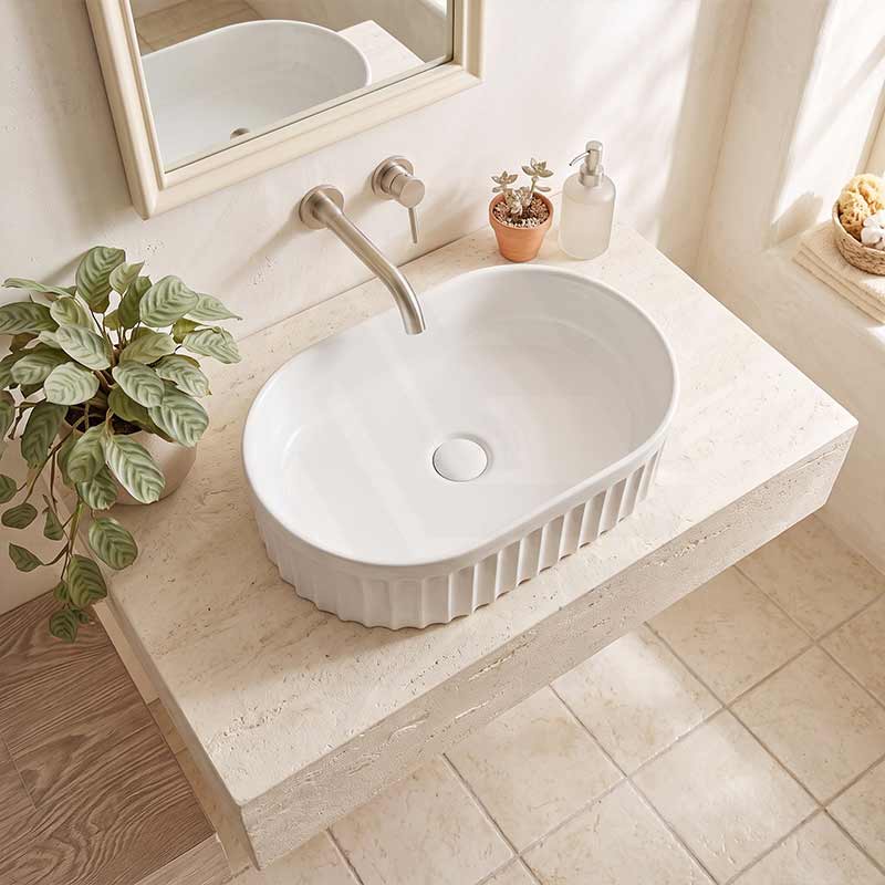 Infinity Oval Fluted Ceramic Above Counter Basin 555x355x150mm - Variant Colour