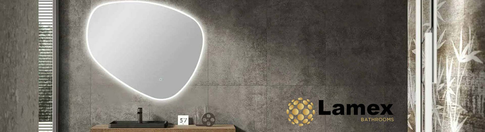 Contemporary bathroom with Lamex framed LED mirrors and floor wastes.