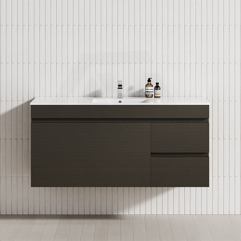 Modern floating bathroom vanity with single bowl, featuring 2 drawers and a door