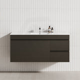 Modern floating bathroom vanity with single bowl, featuring 2 drawers and a door