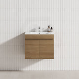A modern bathroom featuring a Tasmanian oak wall-hung vanity cabinet with a single bowl sink
