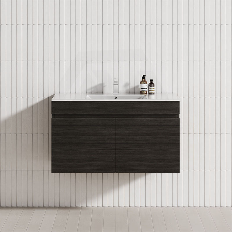 Modern bathroom featuring a wall-hung vanity in Shannon Oak