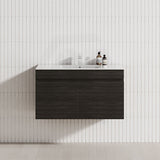 Modern bathroom featuring a wall-hung vanity in Shannon Oak