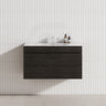 Modern bathroom featuring a wall-hung vanity in Shannon Oak